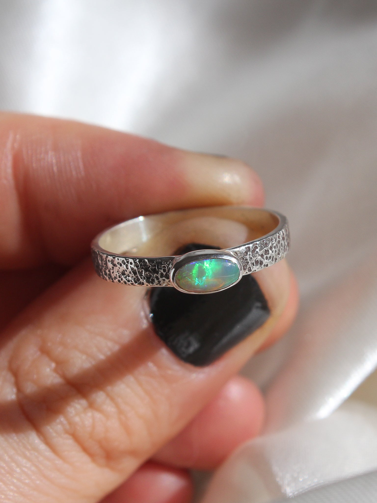Handmade 925 sterling silver ring with Australian lightning ridge stone on a textured band size 8