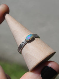 Handmade 925 sterling silver ring with Australian lightning ridge stone on a textured band size 8