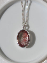 high quality clear quartz necklace with unique red hematite inclusions 925 sterling silver handmade jewelry